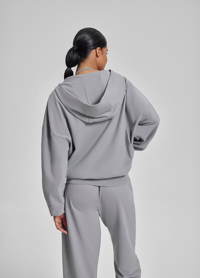 Sweat à capuche oversize avec zip intégral et poches kangourou