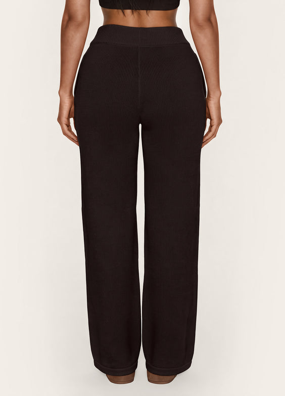 Calça pantalona de tricô com cintura alta