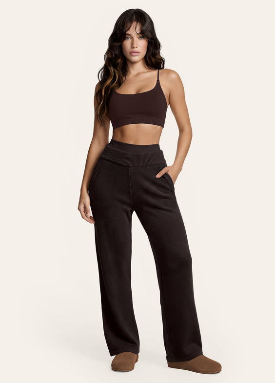 Calça pantalona de tricô com cintura alta