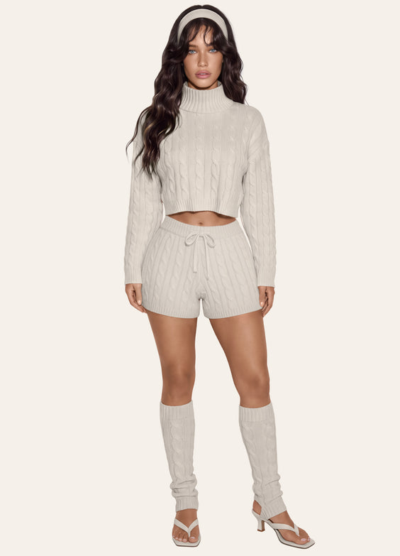 Maglione corto a trecce