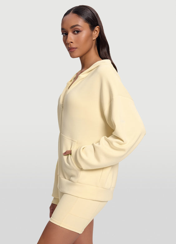 Sweat à capuche et col zippé oversize