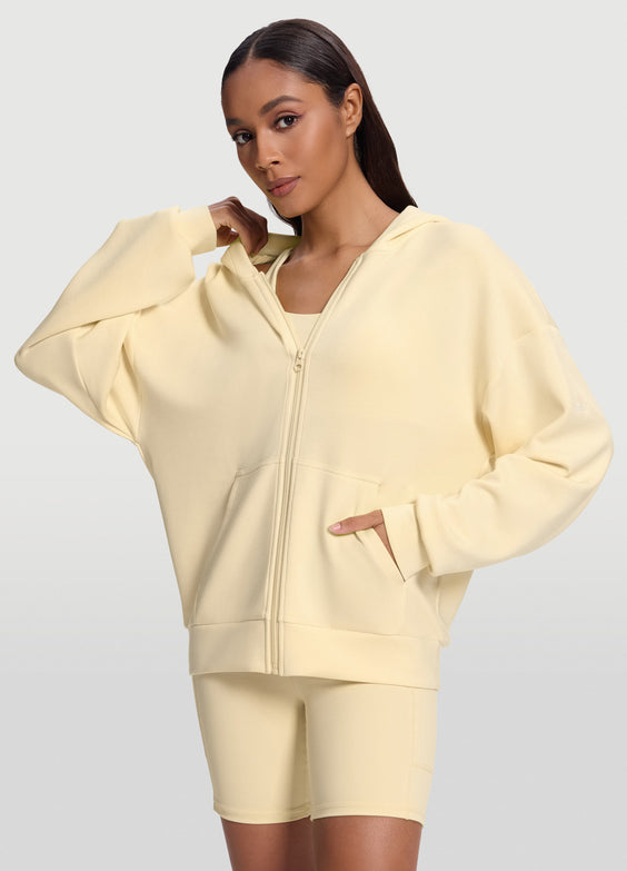 Sweat à capuche et col zippé oversize