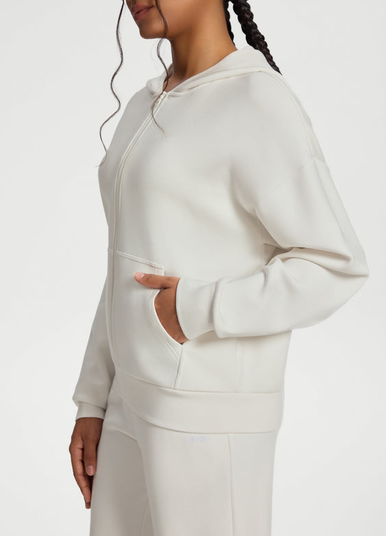 Sweat à capuche et col zippé oversize