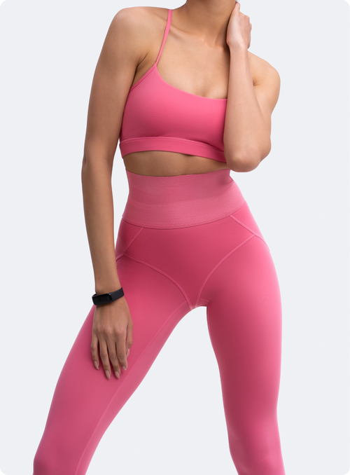 Bombshell pink snake print leggings in medium and matching sports bra in  med.